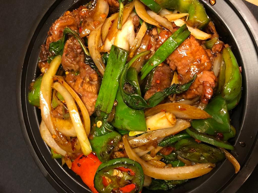 Spicy Beef w/ Basil Dinner(Thai Style) · Thai style. Stir fried Beef with fresh basil, jalapeno, onion, green pepper and ginger. Served with choice of rice. Spicy.