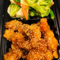 Sesame Chicken Dinner · Sweet and spicy sauce served with veggies. Served with choice of rice. Spicy.