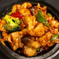 Hunan Chicken Dinner · Broccoli, straw mushroom, waterchestnut, bell peppers and spicy blackbean sauce. Served with...