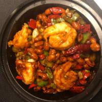 Kung Pao Shrimp  · Celery, bell pepper w/large shrimp, topped w/ peanuts served with choice of rice. Spicy.