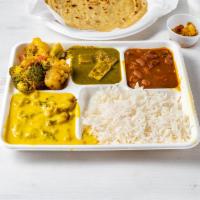 Medium Thali · 2 vegetables, rice, dal or kadhi, 2 roti.