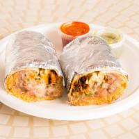 Burrito · Mexican rice, pinto beans, sour cream, pico de gallo and cheddar jack cheese.