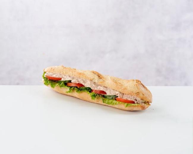 Albacore Tuna Sandwich · Albacore tuna salad, mixed with mayonnaise, lettuce & tomato on a traditional baguette.
