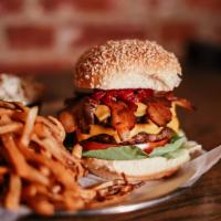 Bacon Burger · 1/4 lb. beef patty with Canadian bacon, tasso ham, applewood smoked bacon, American cheese a...