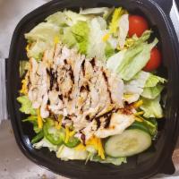 Grilled Chicken Salad · Fresh greens topped with a chargrilled and boneless chicken breast.