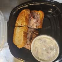 Pulled Pork Sandwich with 1 Side · Pork sandwich served on Texas toast with 1 side.