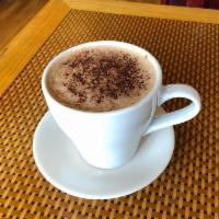 Hot Coco · whipped with cashew milk, raw cacao, and raw turbinado sugar