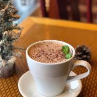 Peppermint Hot Coco · whipped with cashew milk, raw cacao, raw turbinado sugar & peppermint oil