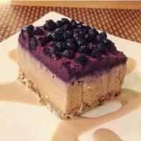 Blueberry Cheesecake Slice · Ingrediants: Almonds, Cashews, Coconut,
Date, Vanilla, Sea Salt, Lemon, Coconut Oil,
Cocon...