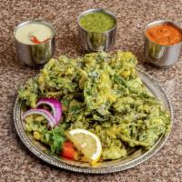 Spinach Pakora · Chickpea flour deep-fried with spinach.