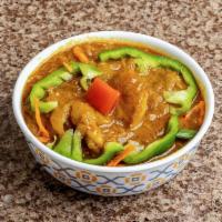 Fish Curry · Fish cooked in mild curry sauce. Served with rice.
