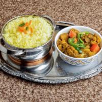 Aloo Gobi · Cauliflower, potatoes and tomatoes cooked in spicy sauce. Served with rice.