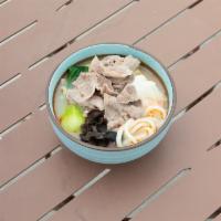 Pot Noodle Soup · Served with veggies and includes mushrooms.