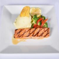 Salmon · Steamed, broiled, garlic sauce, marianted and coconut sauce.
