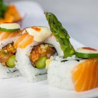 Jalapeno Roll · Spicy salmon, tempura crunch, asparagus, fresh salmon, fresh tuna, jalapeño slices, tornado ...
