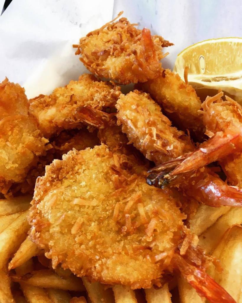 Coconut Shrimp Entree · Plater comes with 10 ct jumbo Shrimp & choice of side.
Big Easy comes with 16 ct jumbo Shrimp, choice of side, coleslaw & 2 Hush Puppies.
