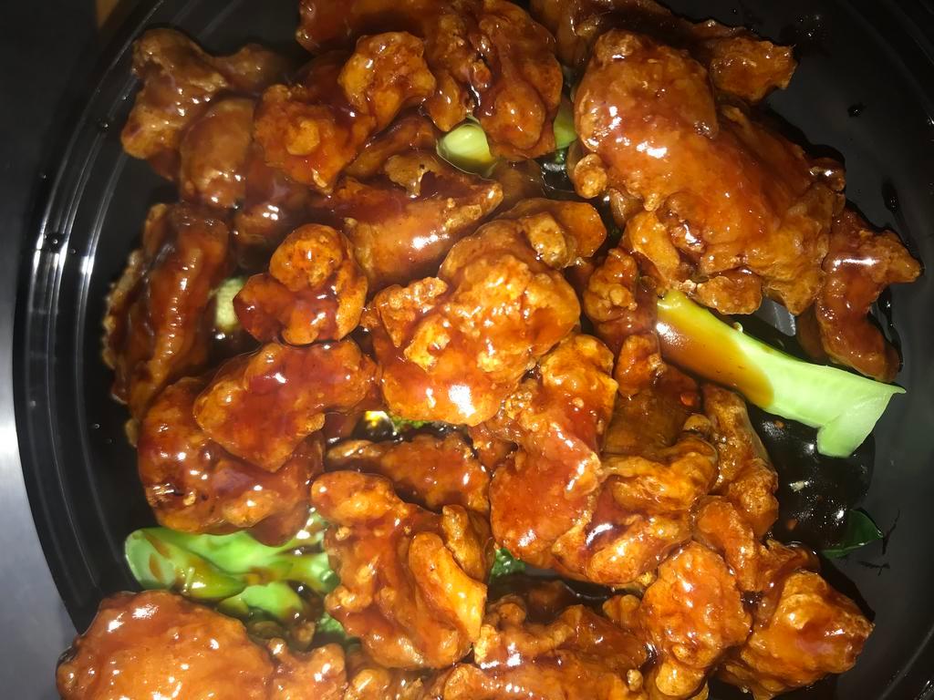 161. General Tso's Chicken · Crispy coated chicken chunks seasoned and sauteed with Chinese garlic sauce. Served with your choice of rice. Hot and spicy.