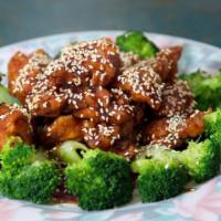 162. Sesame Chicken · Slightly fried chunks of chicken in a heavily blended brown sauce. Served with your choice o...