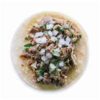 Lengua Taco · Topped with diced onion and cilantro. Choice of corn or flour tortilla.