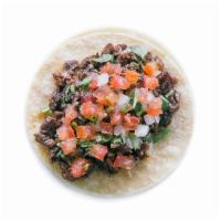 OMG Steak Taco · Steak & scallions sautéed in signature sweet & savory OMG sauce. Topped with diced tomatoes,...