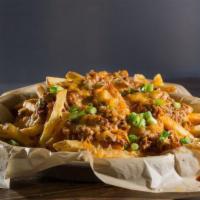 Chili Cheese Fries · Our traditional french fries topped with chili and cheddar Jack cheese. Think that’s too muc...