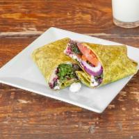 Chance the Veggie Wrap · Spinach wrap with hummus, house kale salad, tomatoes, onions, and feta cheese.