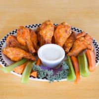Route 66 Spicy Hot Wings · Chicken drummettes and wings tossed in our hot secret sauce.