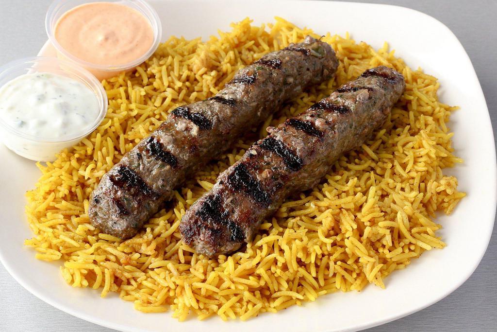 Kafta Kebob Platter · Two skewers of grilled Kafta meat (ground beef); Served over a bed of rice, pick a side and sauce to complete the meal.