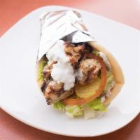 Chicken Kebob Gyro · Tender pieces of marinated chicken breast fire grilled over an open flame. Served in a warm ...
