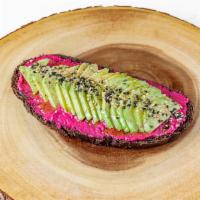 Eat the Rainbow Sandwich · Beet hummus, avocado, and black sesame seeds on a pumpernickel bread.