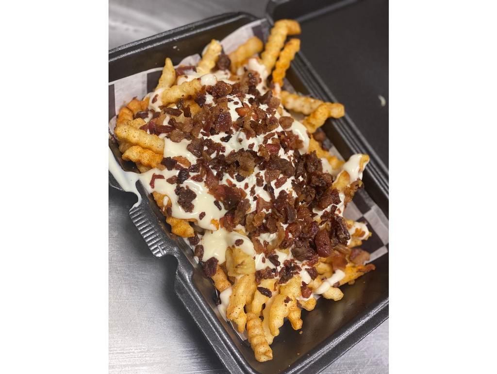 Weird Science Fries · Old bay seasoning, cheddar sauce, bacon, tangy pickle ranch.
