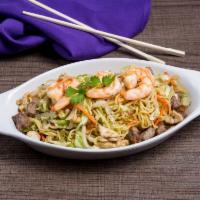 Combo Yaki Soba · Pan-fried noodles with beef, shrimp, chicken and vegetables. Thin yellow Japanese noodles ma...