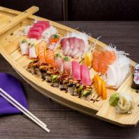 Love Boat · 18 pieces of sashimi, 8 pieces of sushi, dragon roll and tuna roll served on a wooden boat. ...