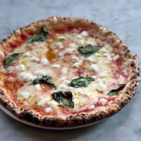 Margherita Pizza · Fior di latte mozzarella, basil, pecorino, extra virgin olive oil and sea salt.