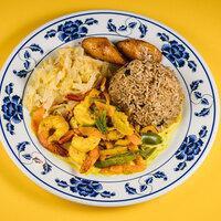 Curry Shrimp · served with rice and peas, steamed cabbage and fried sweet plantains