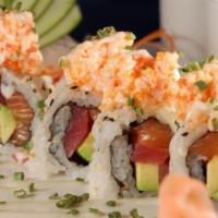 Wildcat Roll · Salmon, tuna, avocado, and spicy sauce topped with mixed shrimp, crab meat, caviar and wasab...