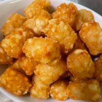 Tater Tots · Crispy, golden tater tots served with choice of 2 sauces.