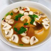 Shrimp Tom Yum Soup ต้มยำกุ้ง · Shrimp, mushroom and cilantro with hot and sour soup. Spicy.