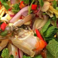 Yum Crab Salad ยำปูดอง · Marinated raw blue crab with mango salad, onion, cilantro, scallion and special house spicy ...