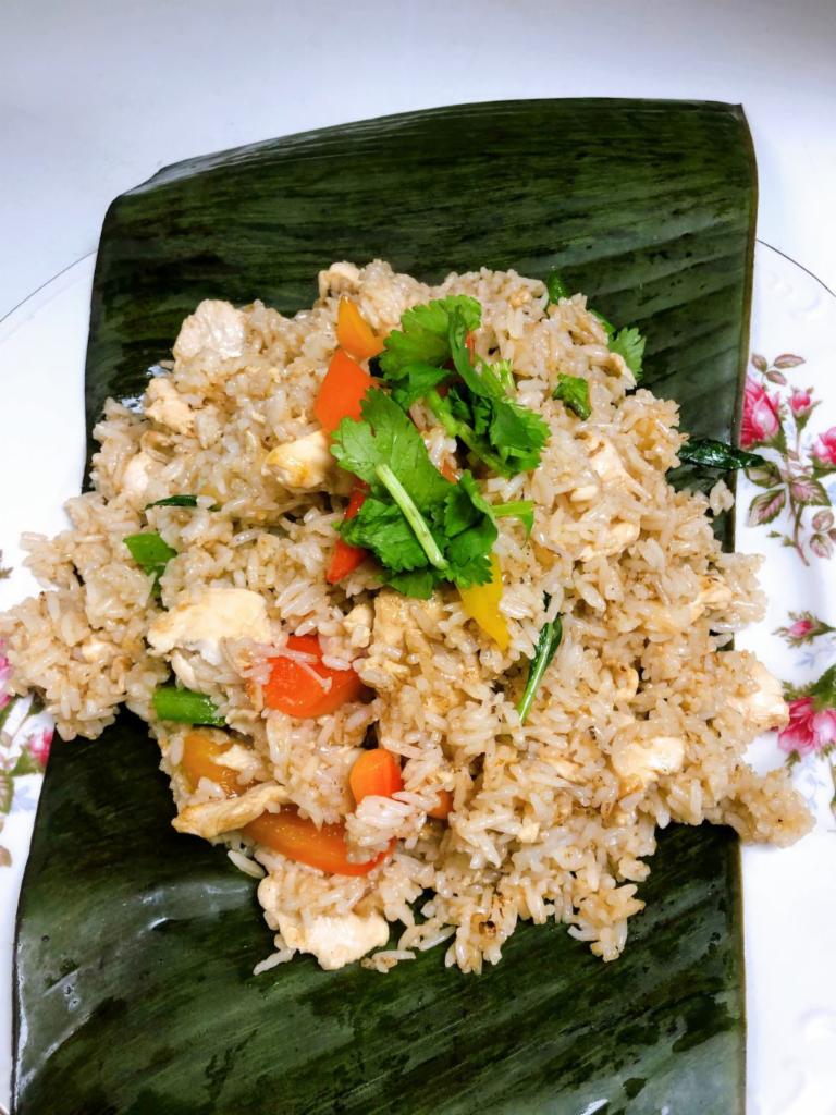 Basil Fried Rice ข้าวผัดกะเพรา · **Traditional Thai Style**Sauteed rice with chili paste, basil and house seasoning. Spicy. (Now we use regular basil instead of Thai holy basil)