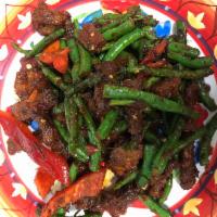 Crispy Pork with String Beans หมูกรอบพริกขิง · Sauteed crispy pork, chili paste, string bean, oyster sauce and bell pepper. Spicy.