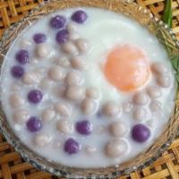 Taro Balls in Coconut milk บัวลอยเผือกไข่หวาน · Served with poached egg and young coconut