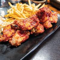 Mary's Chicken Wings · 8 pieces. Free-range. Lightly battered, not crunchy. Served with shoestring fries and salad ...