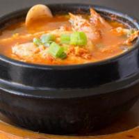 Oyster Tofu Soup · Served with banchan and rice. Oyster, egg, onion, tofu, and scallion.