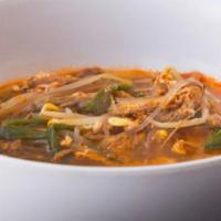 Yukgaejang · Spicy shredded brisket soup. Slow-cooked shreds of brisket, glass noodles, egg, fern, scalli...