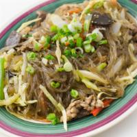 D11. Chapchae · Stir-fried Glass Noodles and Vegetables Glass noodles stir-fried with beef and assorted mush...