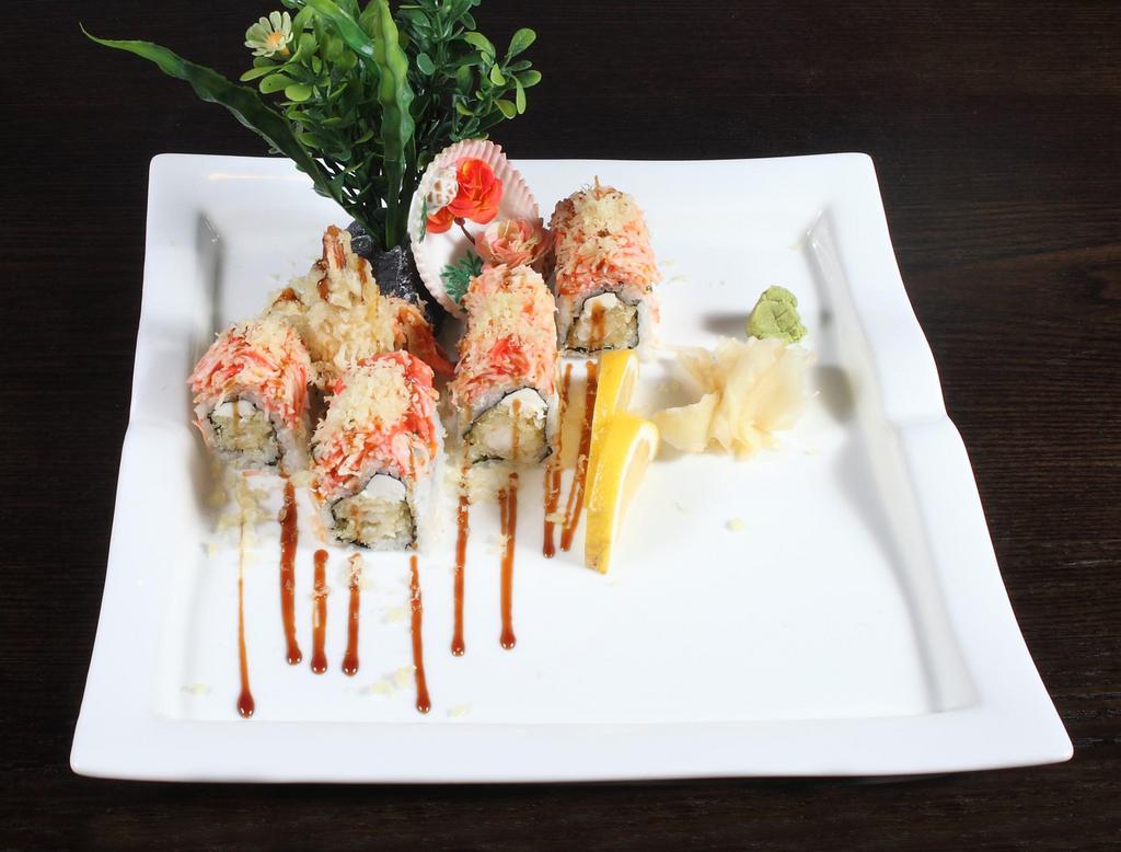 Spongebob Roll · Shrimp tempura and cream cheese inside topped with spicy crab.