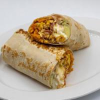 Breakfast Burrito · Served with Beans, Lettuce, Tomato, Cheese, Sour Cream, Avocado