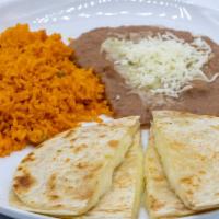 Quesadilla Dinner · 2 quesadillas. Meat of choice. Side of Rice and Beans