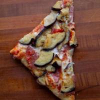 Spicy Sicilian Slice · Our tomato sauce, mozz, spicy salami, roasted eggplant, Calabrian peppers, Sicilian crust